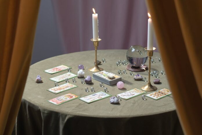 Oracle spell for guidance, divine decision-making ritual, candle magic for clarity, crystal divination spell, intuitive insight ritual, energy clearing for wisdom, third-eye activation spell